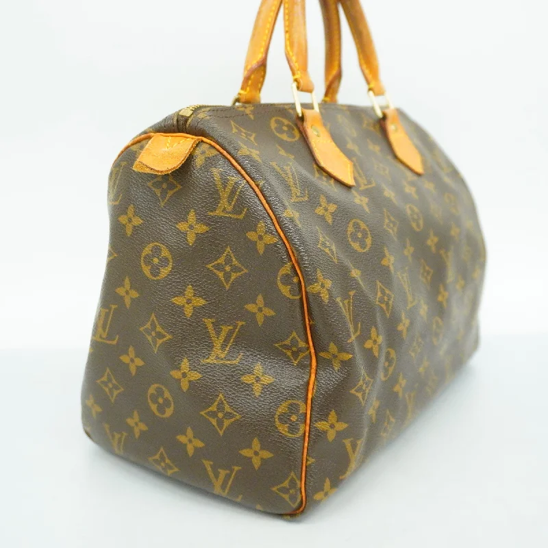 Louis Vuitton Twist bags with a crystal - embellished LV - turnlockLOUIS VUITTONAuth  Monogram Speedy 30 M41108 Women's HandBag