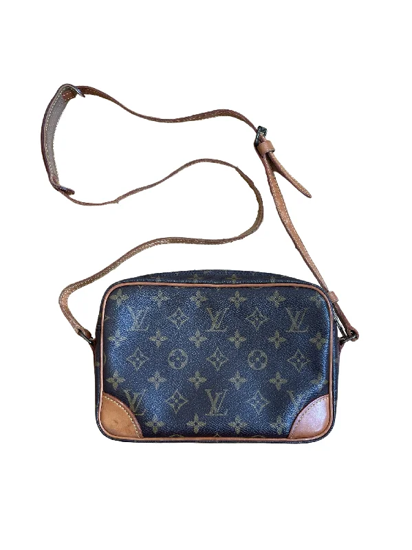 Louis Vuitton Twist bags with a crystal - embellished LV - turnlockLouis Vuitton Trocadero 24 Monogram