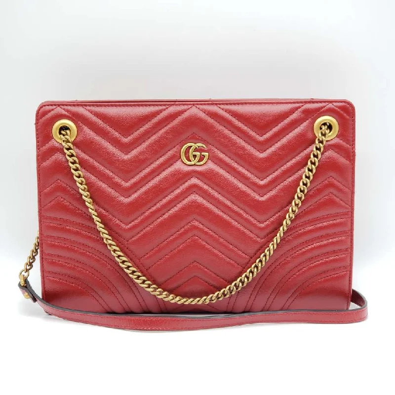 Ladies Gucci handbags with a detachable coin purse insideGucci GG Marmont Quilted Clutch Shoulder Bag