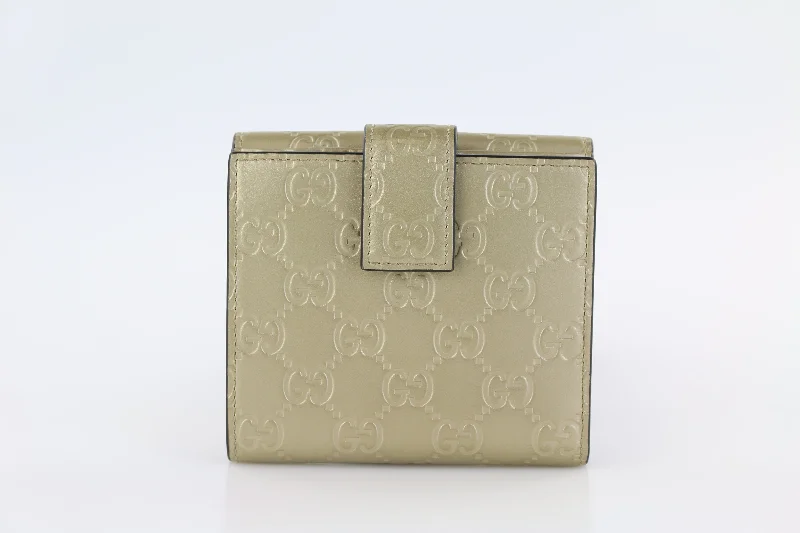 Women Gucci bags with a magnetic snap closure for easy accessGold Guccissima Bow Wallet