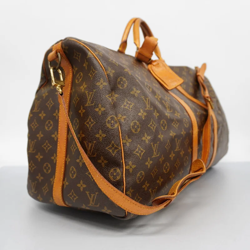 Ladies Louis Vuitton Petite Malle bags with a star - shaped charm for cutenessLouis VuittonAuth  Monogram Keepall Bandouliere 60 M41412