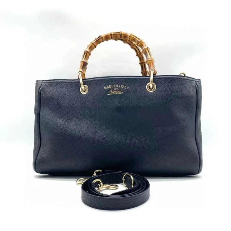 Women Gucci Sylvie bags with a monogram - embossed leatherGucci Bamboo Bag Black Leather Medium HandBag with Removable Strap