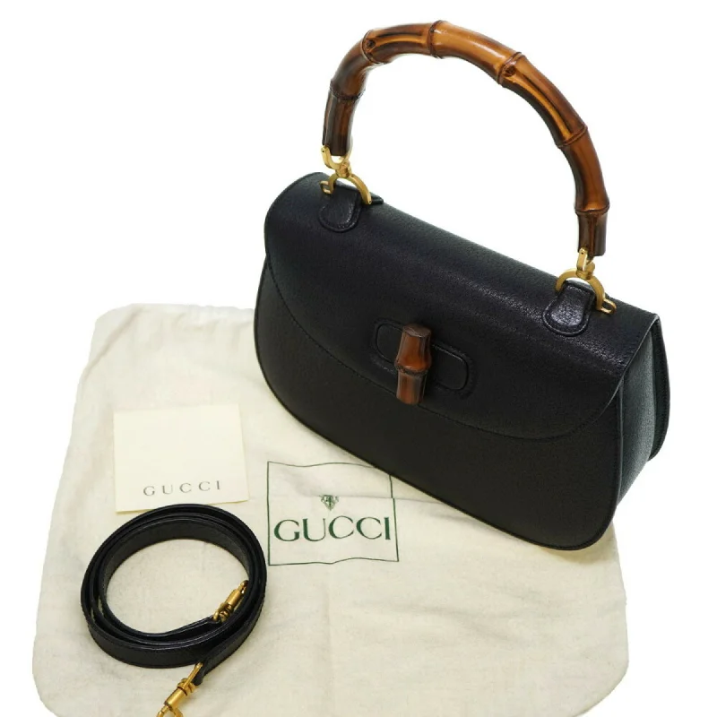 Women Gucci Sylvie bags with a leather - wrapped handleGucci bamboo leather shoulder hand Bag black with strap