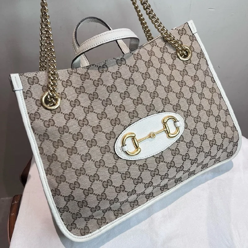 Ladies Gucci shoulder bags with a tassel decorationGucci 1955 Beige White Monogram Large Tote Bag