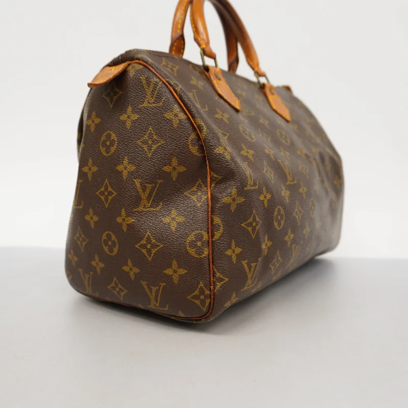 Louis Vuitton Twist bags with a snakeskin - effect panel for a bold lookLouis VuittonAuth  Monogram Speedy 30 M41108 Women's Handbag