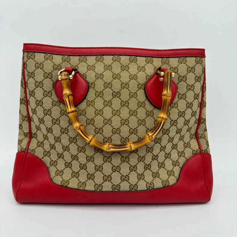 Women Gucci tote bags in GG Supreme canvas for a branded feelGucci Bamboo Shopper Diana Beige/Red Canvas Large Tote Bag