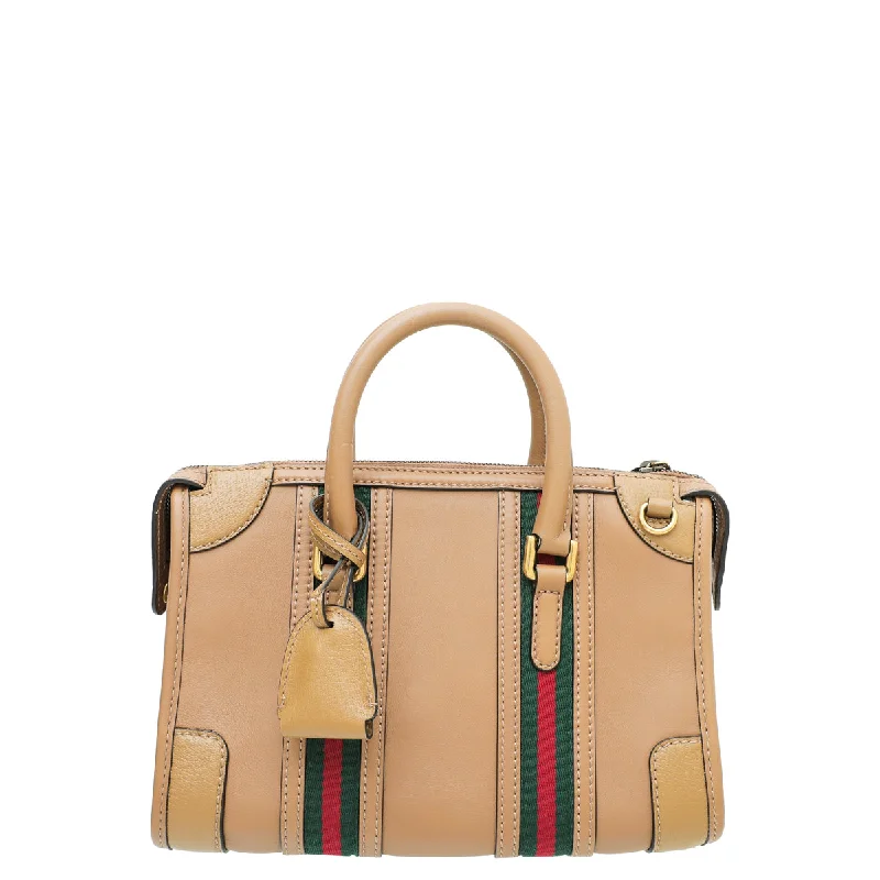 Ladies Gucci Dionysus bags in a pastel colorGucci Brown GG Small Top Handle Bag