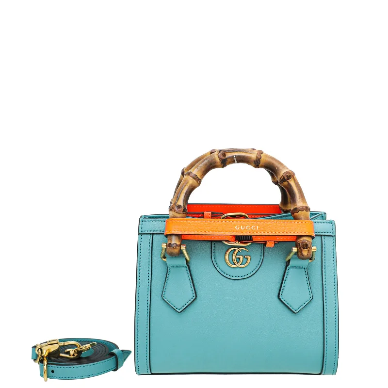 Women Gucci bags with a snap - button closure and a decorative charmGucci Light Teal Blue Diana Mini Tote Bag