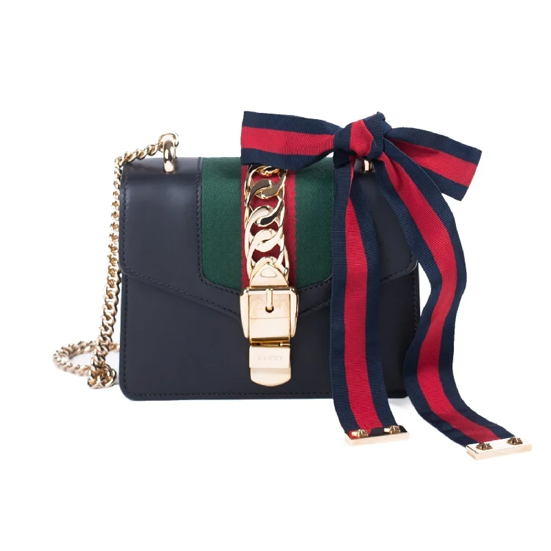 Ladies Gucci Dionysus bags with a star - shaped charmGucci Sylvie Leather Mini Chain Bag