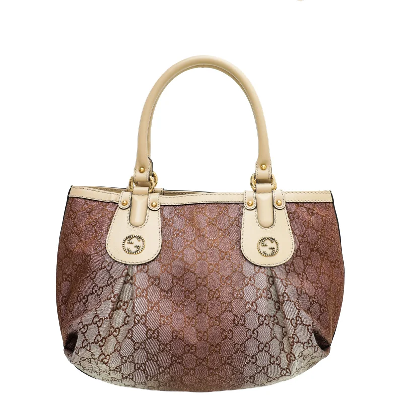 Women Gucci bags with a magnetic snap closure for easy accessGucci Bicolor Scarlett Stud Tote Bag