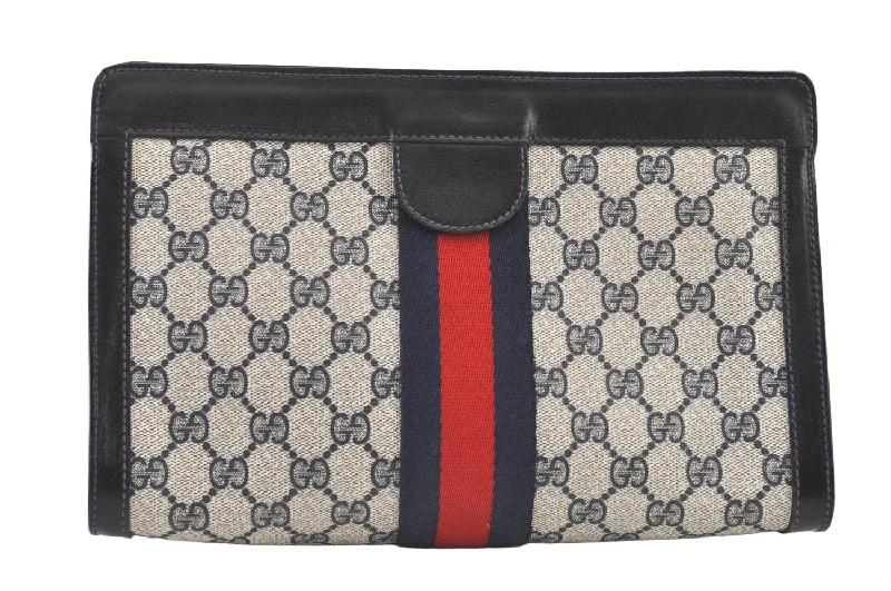 Women Gucci Sylvie bags featuring the signature web stripeAuthentic GUCCI Sherry Line Clutch Hand Bag GG PVC Leather Navy Blue Junk 0815K