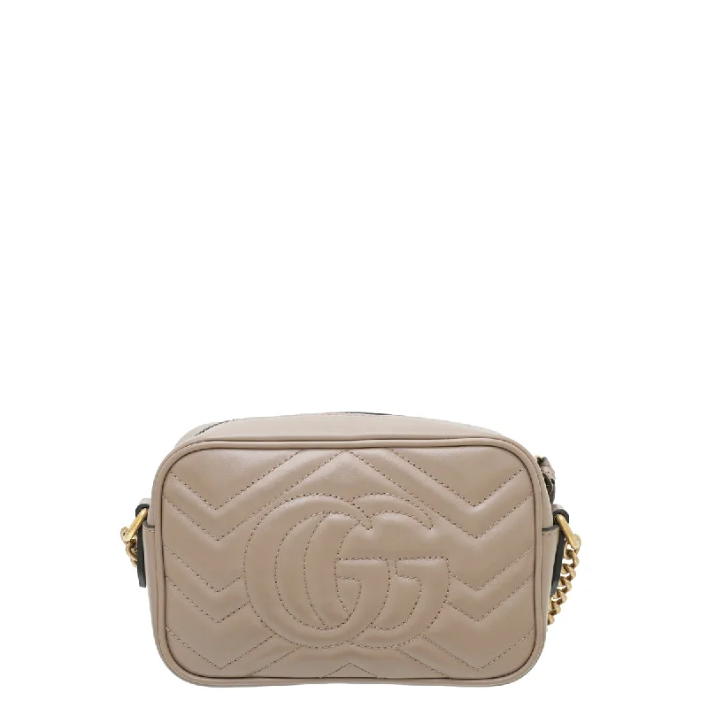 Gucci Marmont bags for women with a contrast - colored interiorGucci Dusty Pink GG Marmont Matelassé Mini Bag