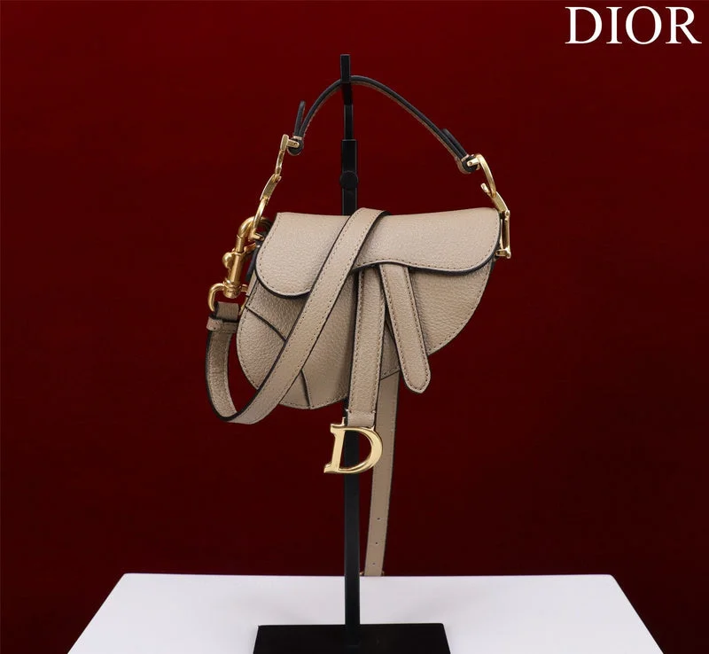 Christian Dior handbags with a snap - button closure and a decorative buckleDior Bag