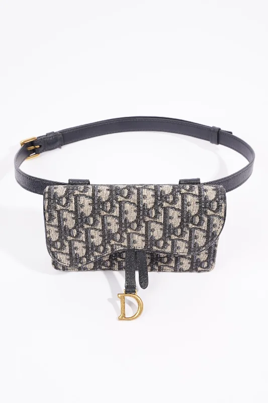 Christian Dior Saddle bags with a studded trim for a bold lookChristian Dior Saddle Belt Bag Oblique Canvas