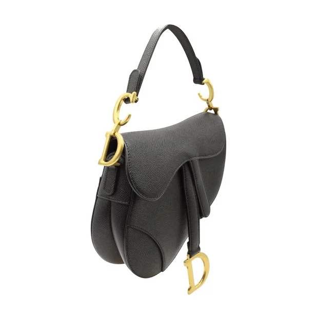 Christian Dior Saddle bags with a patent leather finish for a shiny lookDIOR Black Leather Saddle Bag