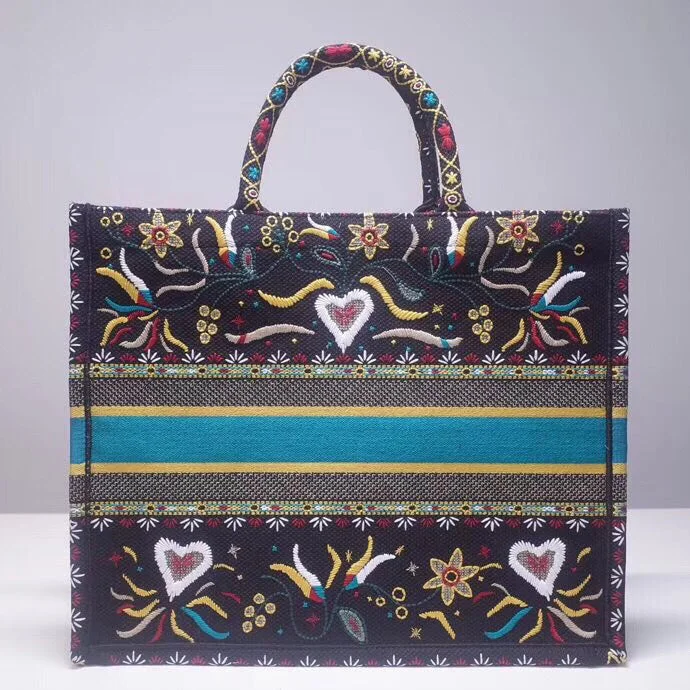 Trendsetting Christian Dior crossbody bags with a colorful strapDior Flowers And Hearts Book Tote In Multicolor Canvas