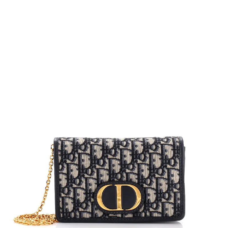 Christian Dior Saddle bags with a studded trim for a bold look30 Montaigne 2-in-1 Pouch Oblique Canvas