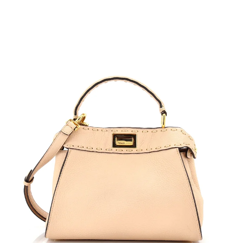 Christian Dior handbags with a snap - button closure and a decorative buckleSelleria Peekaboo Bag Leather Mini